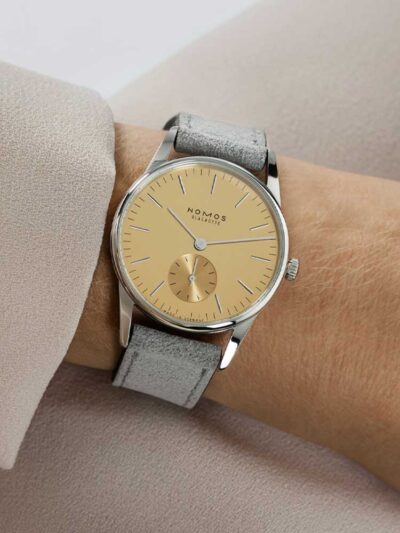 Nomos ORION 33 Gold 359 on wrist